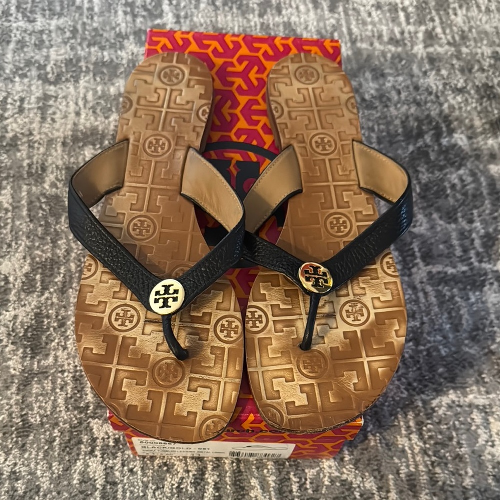 Tory Burch Black and Tan Flip Flops